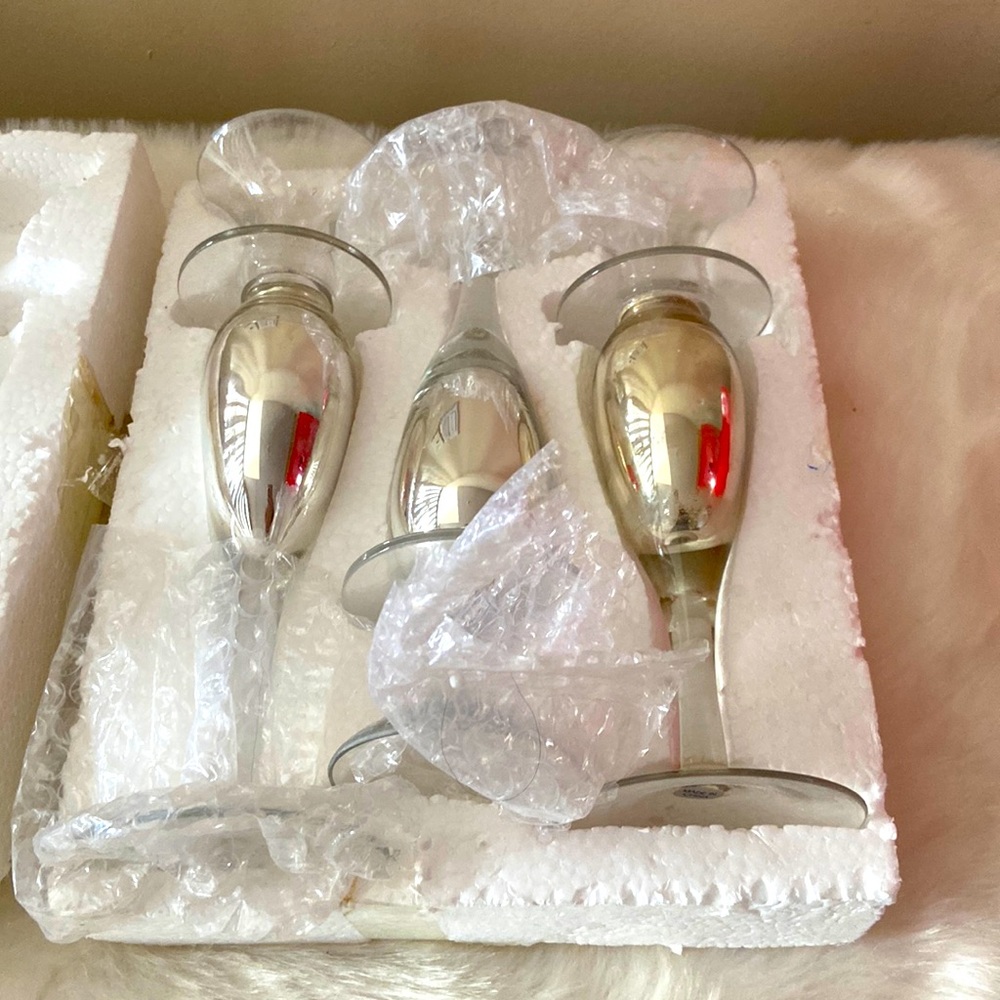 Set of three vintage glass candle sticks